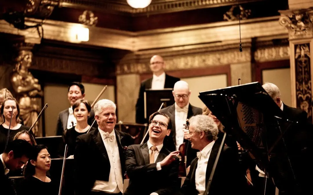 Cleveland Orchestra, Franz Welser Möst und Vikingur Olafsson lachend während dem Schlussapplaus